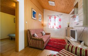 TV a/nebo společenská místnost v ubytování Holiday Home Melnica Iii