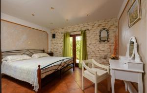 Postel nebo postele na pokoji v ubytování Holiday Home Melnica Iii
