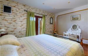 Postel nebo postele na pokoji v ubytování Holiday Home Melnica Iii