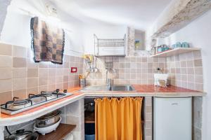 Kuchyň nebo kuchyňský kout v ubytování Casa Colombo & Casa Scipione by Rentbeat