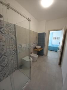 Koupelna v ubytování A Balata Apartments + 40 fotografií