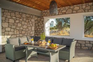 Posezení v ubytování Anasa Rustic Villa