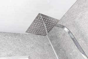 a shower with a metal grid on the ceiling at Cosy Home In Darlington in Darlington