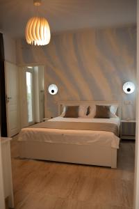 Postel nebo postele na pokoji v ubytování Halta Pescăruş Accommodation
