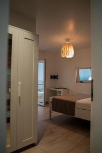 Postel nebo postele na pokoji v ubytování Halta Pescăruş Accommodation