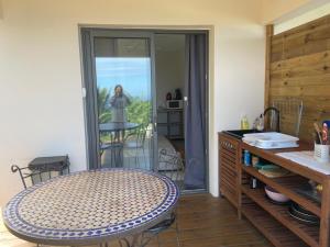 Φωτογραφία από το άλμπουμ του See view location σε Saint-Leu