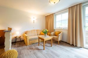 Część wypoczynkowa w obiekcie Hubengut Bed and Breakfast