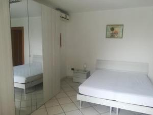 Postel nebo postele na pokoji v ubytování B & B dépendance