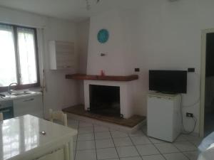 Kuchyň nebo kuchyňský kout v ubytování B & B dépendance + 1 fotografie