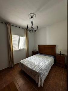 Ένα ή περισσότερα κρεβάτια σε δωμάτιο στο Chalet con piscina privada +23 φωτογραφίες