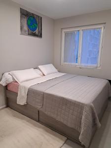 Ένα ή περισσότερα κρεβάτια σε δωμάτιο στο Apparemment T11