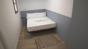 Postel nebo postele na pokoji v ubytování FORUM EXPERIENCE Adults Only