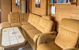 a waiting room with a couch and two chairs at Ferienhaus 7 In Thalfang in Thalfang