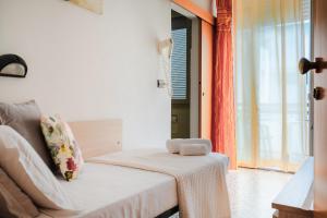 Postel nebo postele na pokoji v ubytování Hotel Sayonara