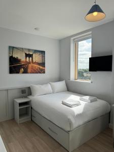 Cama o camas de una habitación en SWUITE GALWAY