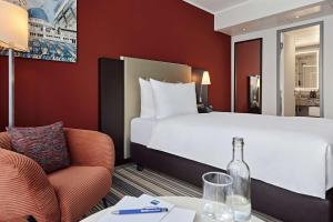 Postel nebo postele na pokoji v ubytování Dorint Hotel Esplanade Jena