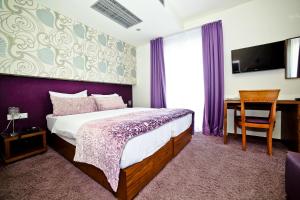 Letto o letti in una camera di Hotel Gala Split