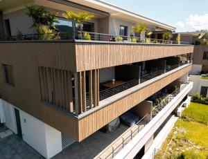 an aerial view of a building with balconies at Bella Vista Seeblick in Annenheim