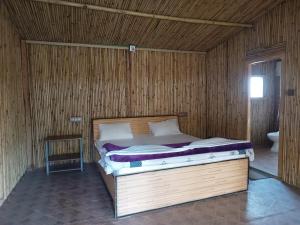 Voodi või voodid majutusasutuse The Sylvan Hut toas