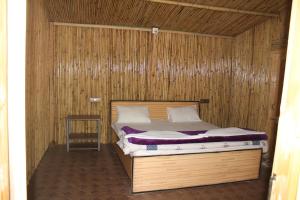 Voodi või voodid majutusasutuse The Sylvan Hut toas