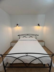 Postel nebo postele na pokoji v ubytování Is Janas