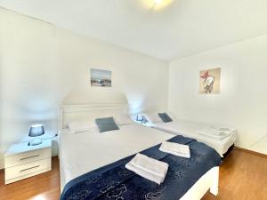 Katil atau katil-katil dalam bilik di FOR-A Apartmani