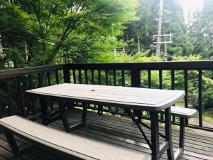 Uma varanda ou terraço em モリソンヴィラ 石垣のログハウス