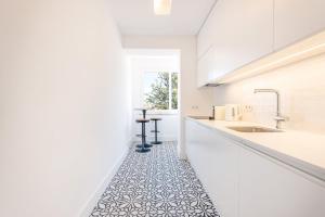 Η κουζίνα ή μικρή κουζίνα στο GuestReady - Vibrant Soul in the Heart of Belem