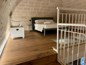 Vuode tai vuoteita majoituspaikassa Benedetta Sassi Suite