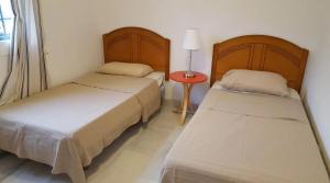 Postel nebo postele na pokoji v ubytování Marina del Este sea view
