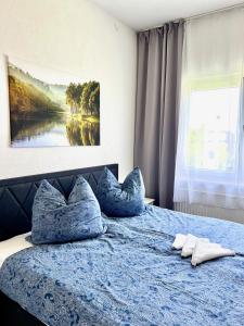 Giường trong phòng chung tại BUDGET City Appartement Küche,Bad, Parken im Zentrum von Ravensburg
