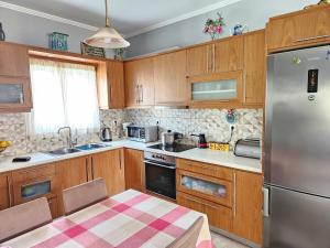Kuchyň nebo kuchyňský kout v ubytování IPSOS SUPERIOR APARTMENTS