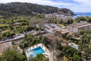 an aerial view of a city with a parking lot at Bellavista Attic in Port de Soller