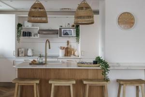 Η κουζίνα ή μικρή κουζίνα στο GuestReady - Bohemian Apt with Marina View