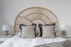Ένα ή περισσότερα κρεβάτια σε δωμάτιο στο GuestReady - Bohemian Apt with Marina View