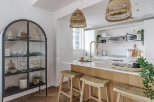 Η κουζίνα ή μικρή κουζίνα στο GuestReady - Bohemian Apt with Marina View