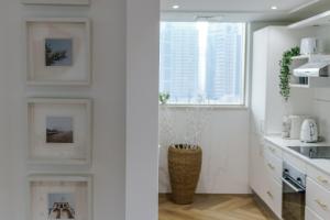Η κουζίνα ή μικρή κουζίνα στο GuestReady - Bohemian Apt with Marina View
