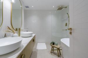Ένα μπάνιο στο GuestReady - Bohemian Apt with Marina View
