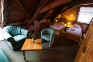 Postel nebo postele na pokoji v ubytování Hotel U Lípy + 30 fotografií