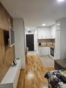 Η κουζίνα ή μικρή κουζίνα στο Apartman GARDEN PARK Doboj