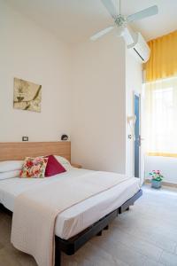 Postel nebo postele na pokoji v ubytování Hotel Sayonara