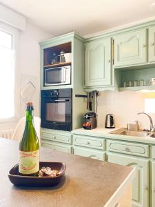 Køkken eller tekøkken på La maison de la Garenne