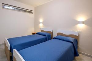 Ένα ή περισσότερα κρεβάτια σε δωμάτιο στο Taty’s house