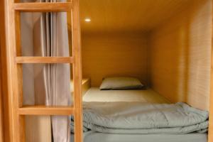 Postelja oz. postelje v sobi nastanitve Ninap hostel