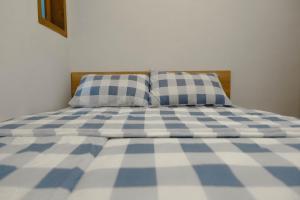 Postelja oz. postelje v sobi nastanitve Ninap hostel