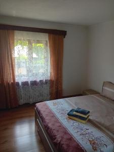 Postel nebo postele na pokoji v ubytování Casa Cristian
