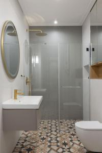 Kúpeľňa v ubytovaní LTC - Apartments Świętego Piotra