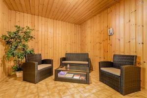 A seating area at Haus Hubertus