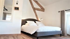 Letto o letti in una camera di Hotel Savel