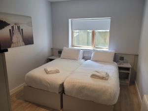 Cama o camas de una habitación en SWUITE GALWAY